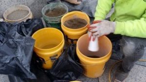 mixing mortar during the onsite training